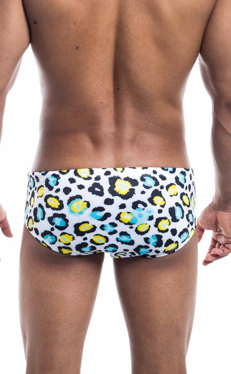 Oceanico swim brief in white featuring bold colorful leopard print with black yellow and light blue spots