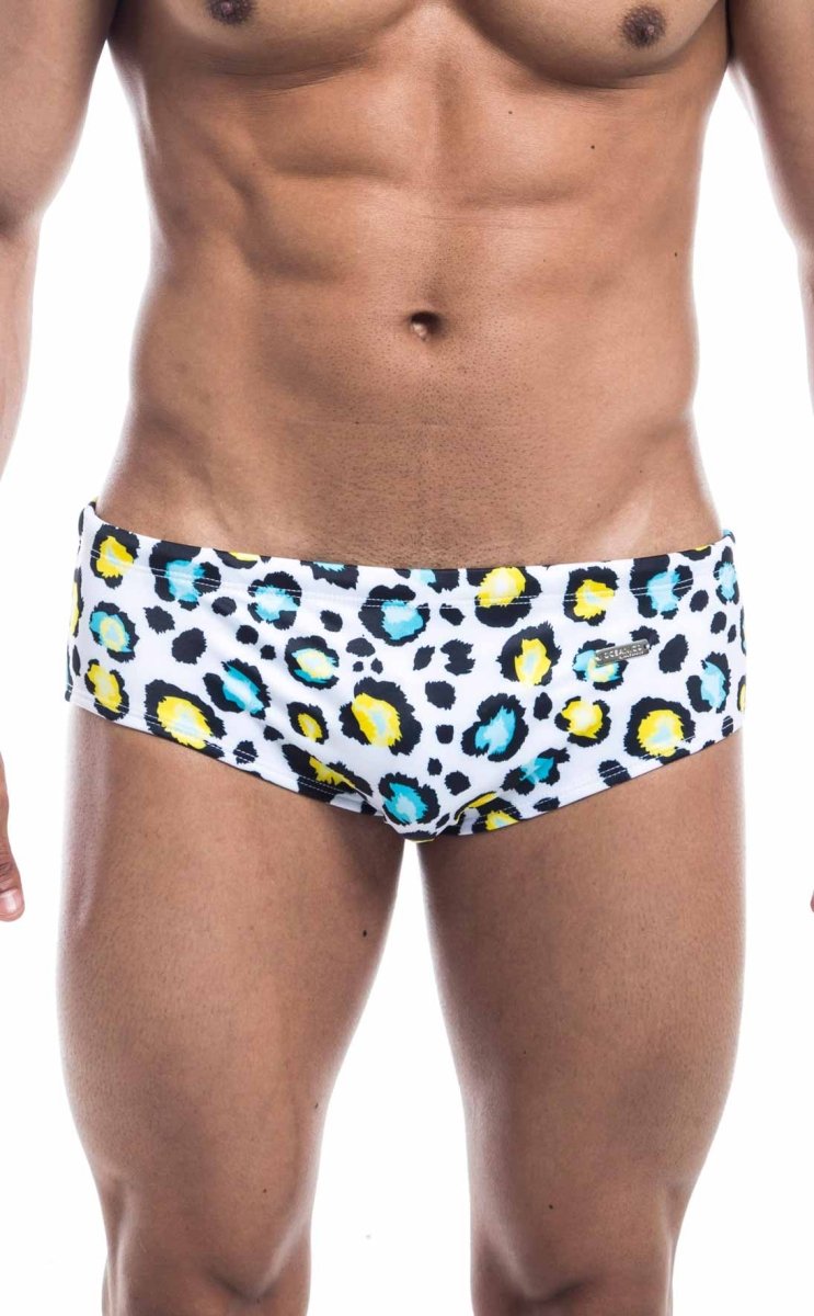 White Oceanico swim brief with bold leopard print featuring yellow and teal spots designed for swimwear use