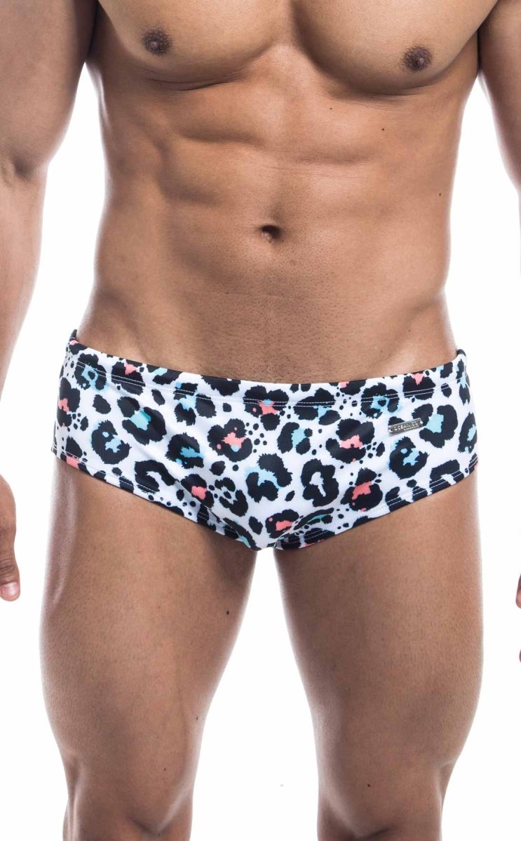 Oceanico swim brief white swim trunks with bold leopard print black spots and pink and light blue accents