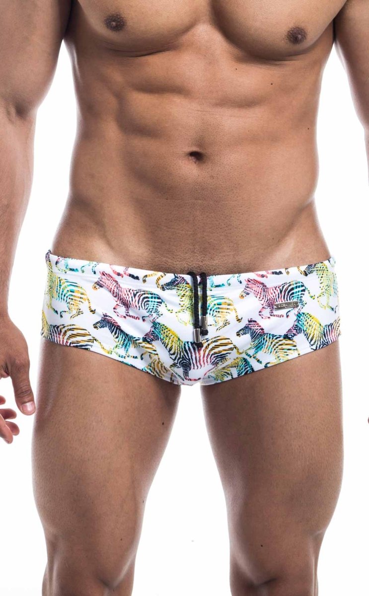 White oceanico swim brief with vibrant multicolored zebra pattern and black zipper closure for beachwear