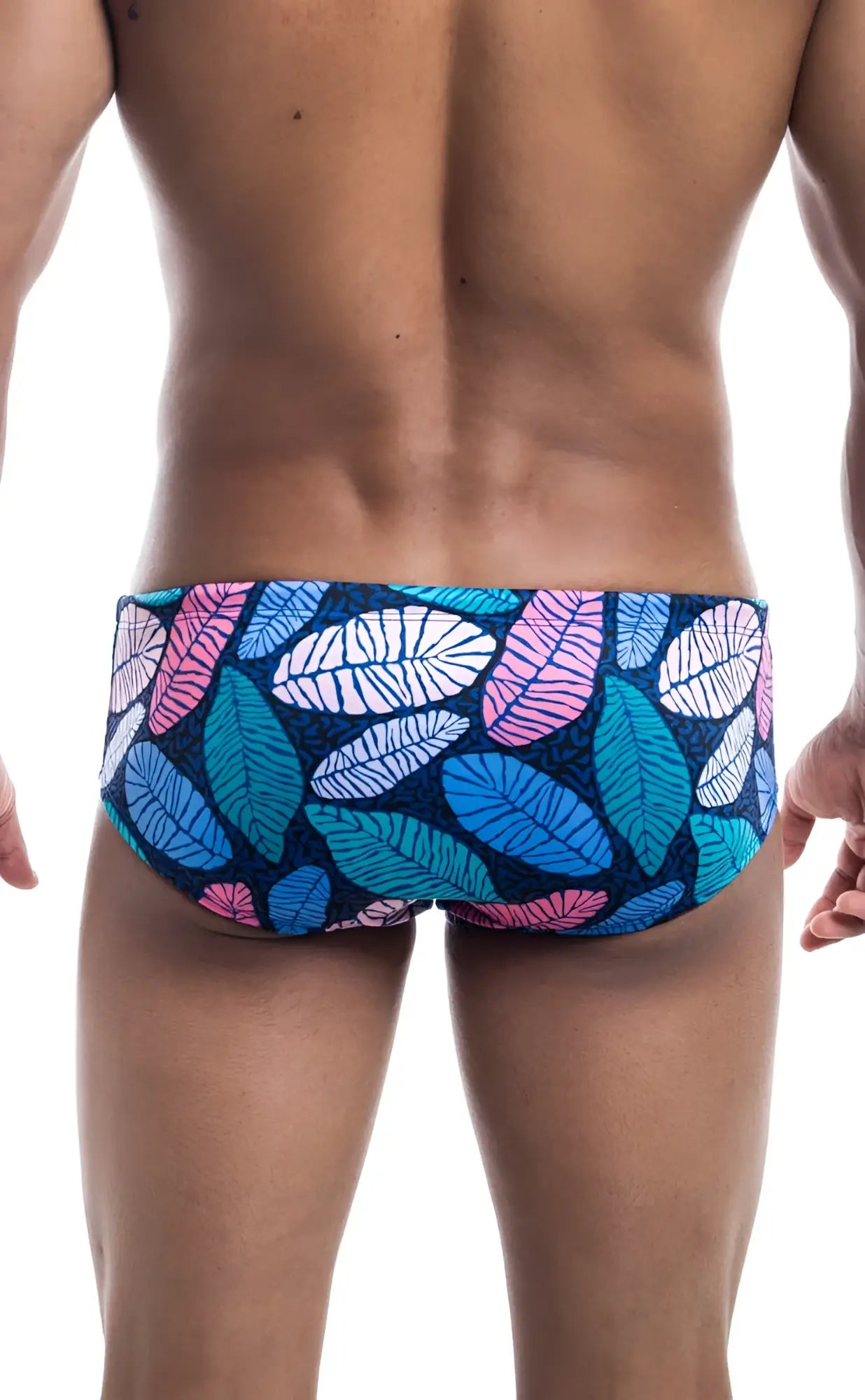 Oceanico swim brief features vibrant blue pink and white leaf patterned trunks on a dark navy base for beachwear