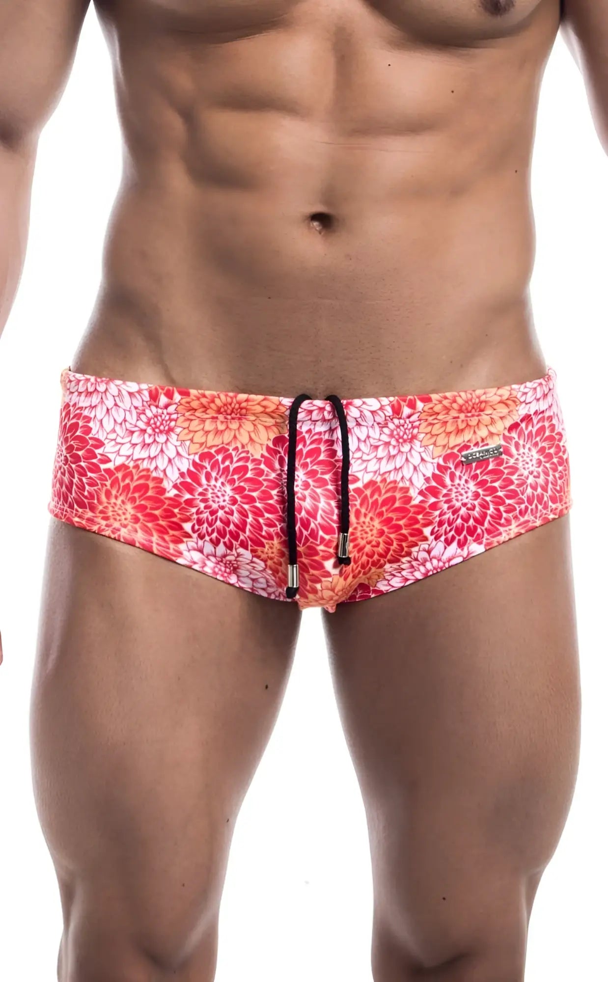 Oceanico swim brief featuring vibrant red and pink floral pattern with black drawstring ties for beachwear