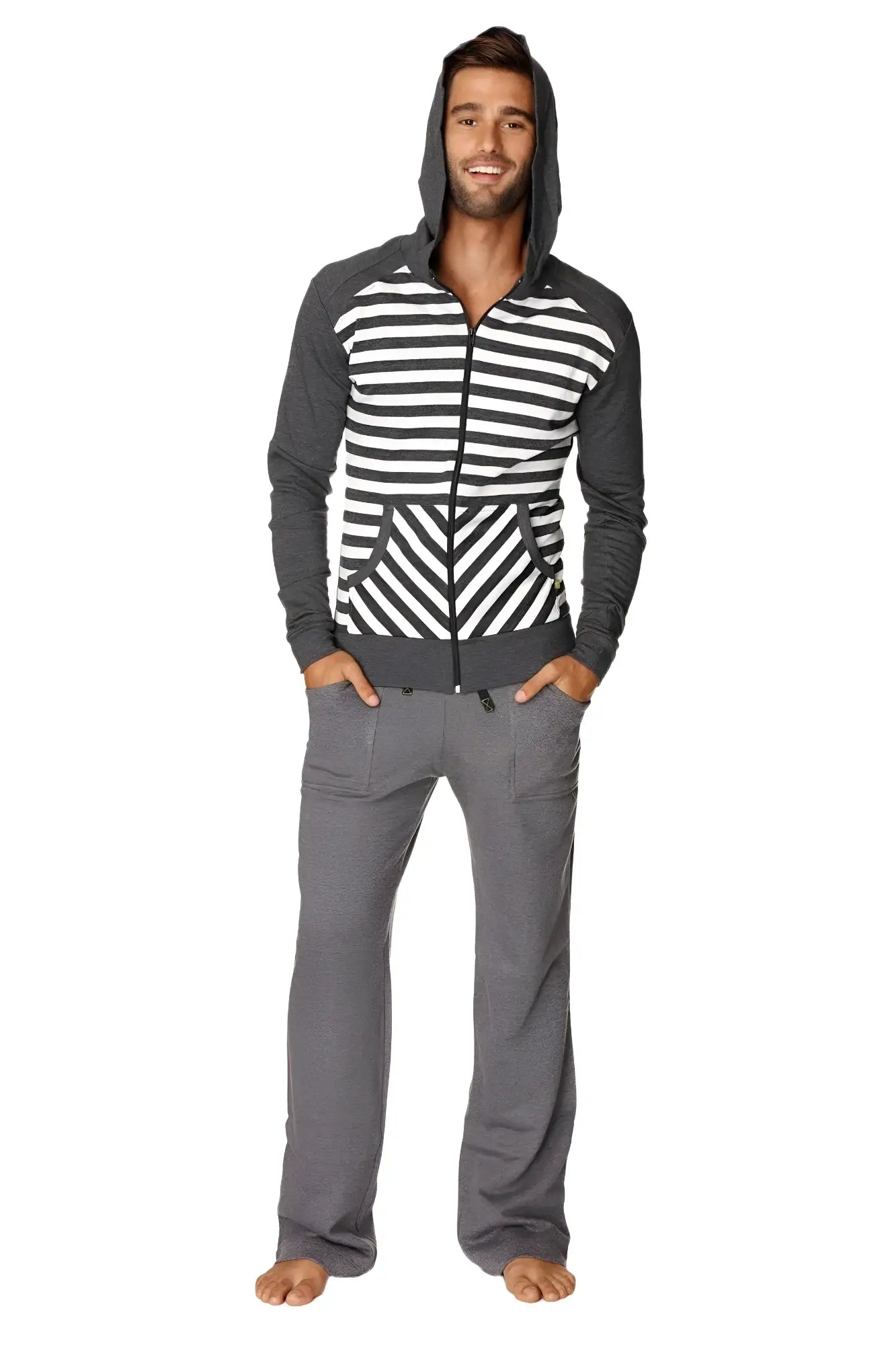 A man wearing the original limited edition charcoal stripe form-fit crossover yoga fleece hoodie with geometric patterns