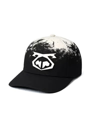 Black oxidize snout cap with white splatter paint effect and bold geometric logo on the front for casual wear