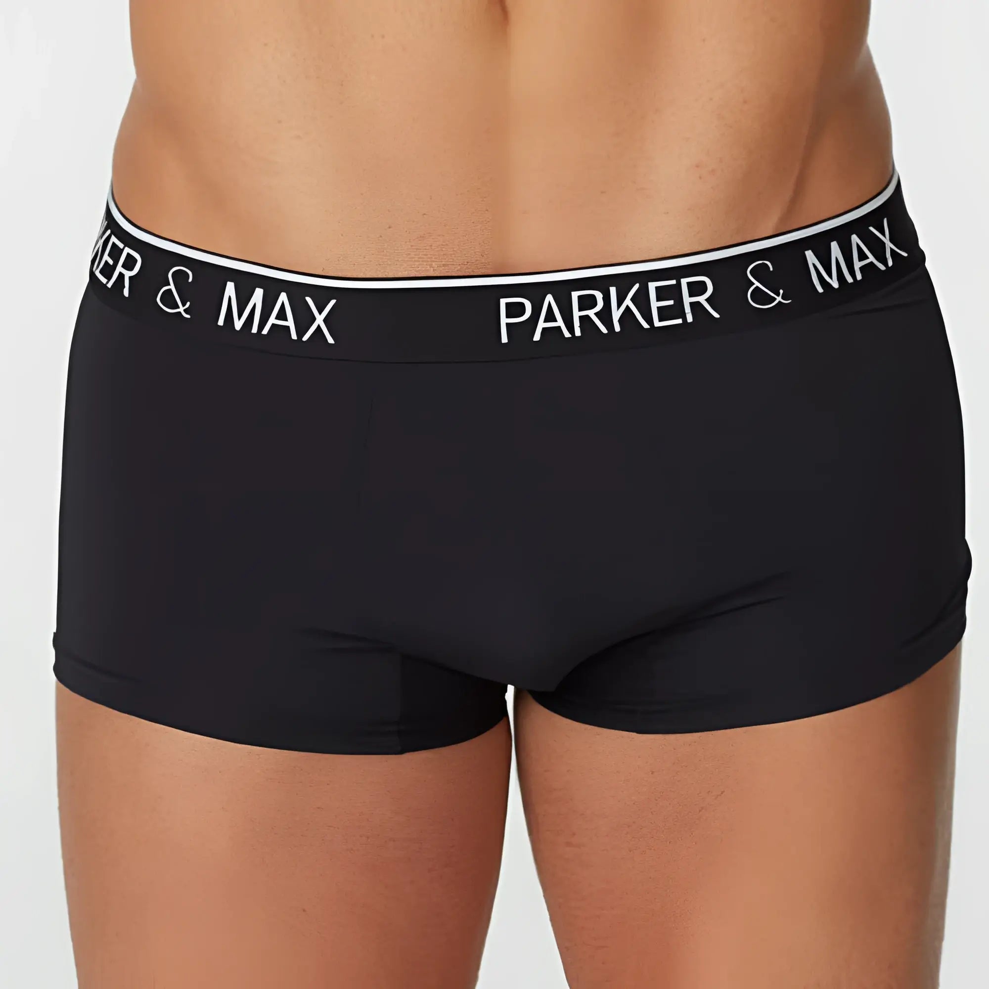 Black parker and max pmfp_t1 boxer trunk briefs with white elastic waistband featuring bold brand name