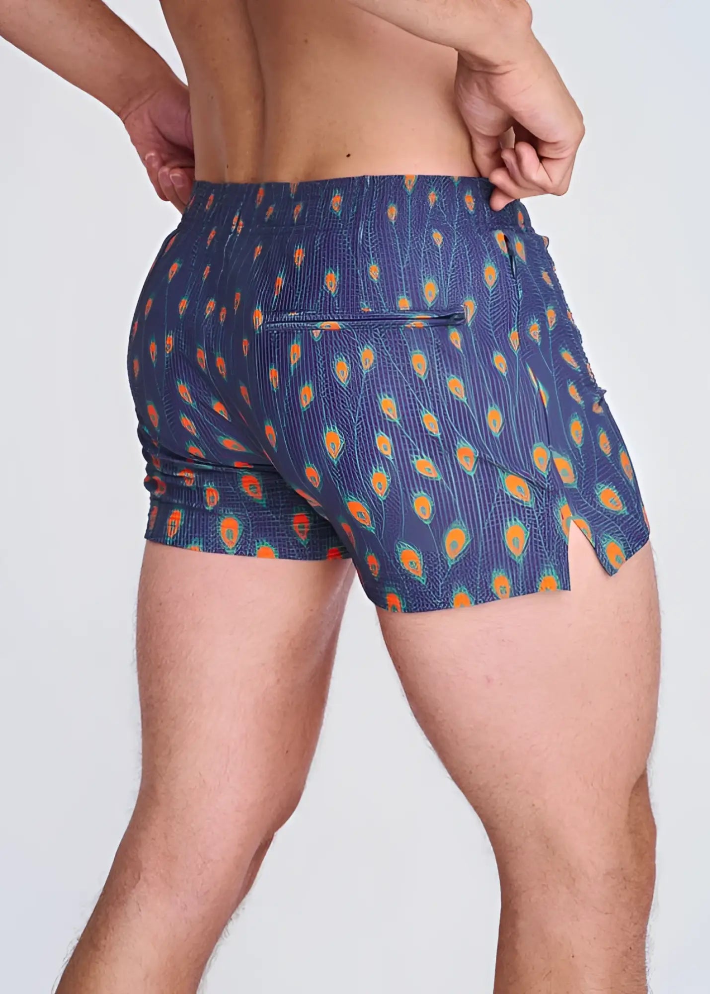 Blue peacock feathers seersucker swim shorts with vibrant orange teal pattern elastic waistband and side slit