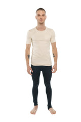 A man wearing a sand beige perfect pocket crew-neck tee paired with black form-fitting leggings shows the front side