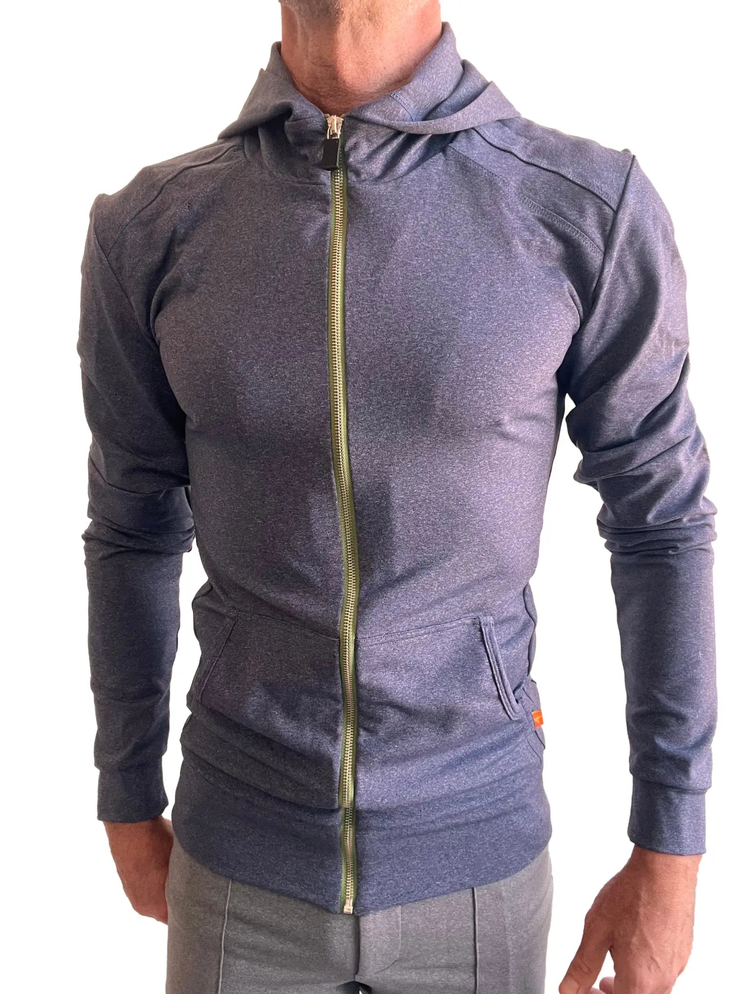 Performance-premium form-fit crossover yoga track hoodie in dark heather gray with gold zipper and subtle orange branding