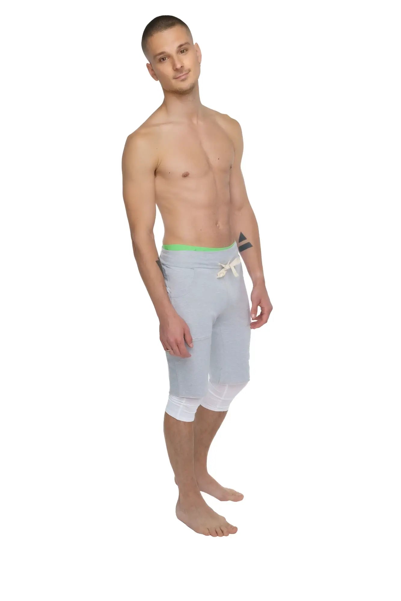 Performance yoga leggings 3/4 in arctic white featuring light gray semi-transparent shorts with neon green waistband