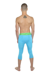 Performance yoga leggings 3/4 in bright blue form-fitting fabric with neon green waistband for active wear