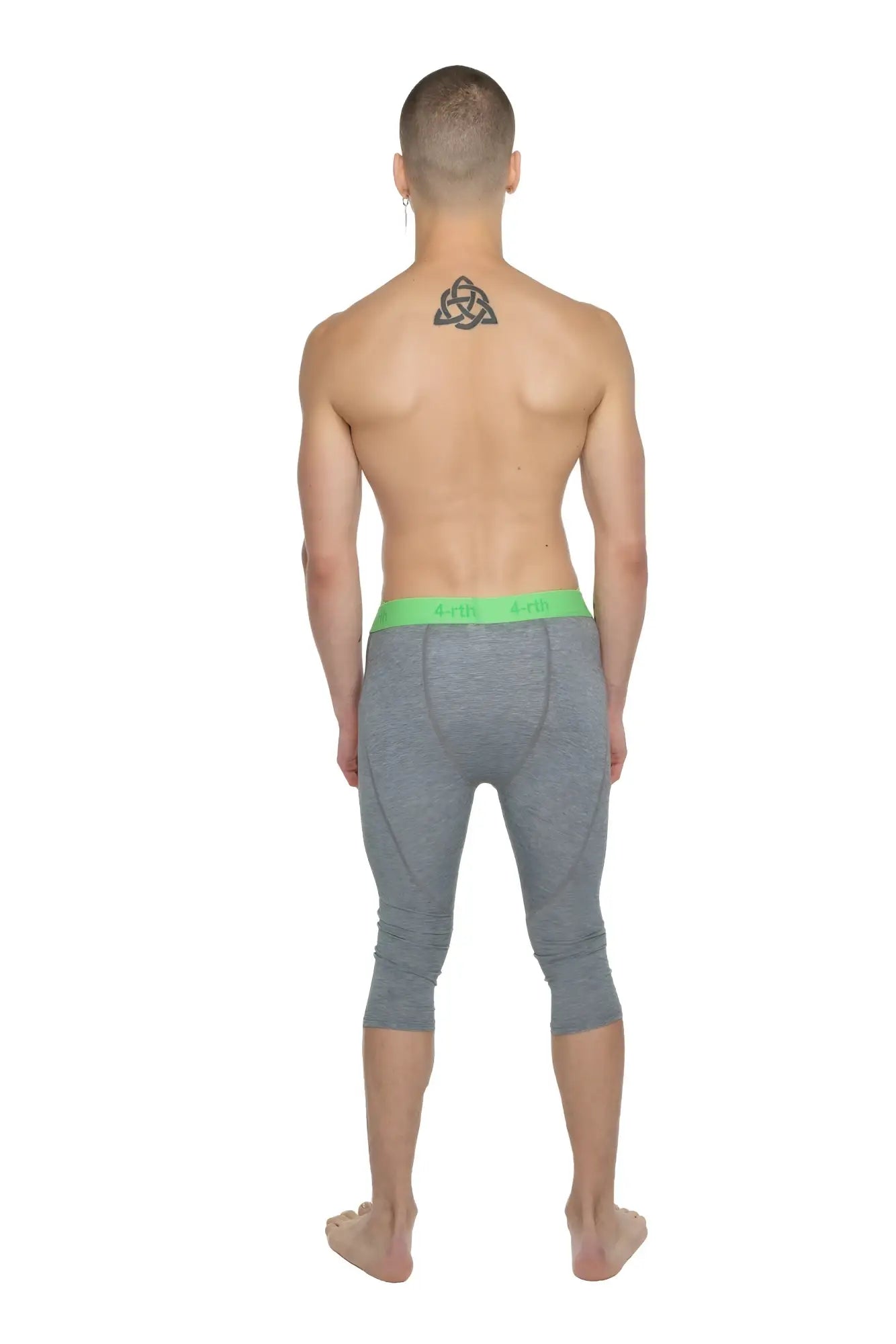Gray heathered steel heather performance yoga leggings with bright green waistband in 3/4 capri length