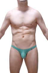 Teal form-fitting men’s thong with subtle seam detail and small red logo on waistband petitq bikini dome green