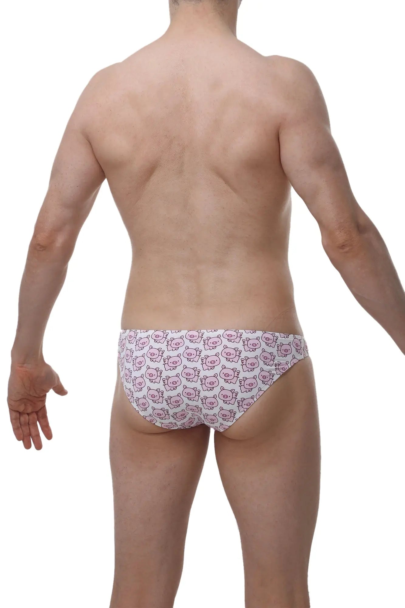 White briefs with a repeating pink cartoon pig face pattern from petitq bikini dome piggy love collection