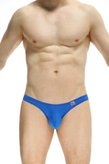 Bright blue form-fitting men’s briefs with small red and white logo on waistband from PetitQ Bikini Dome plum blue collection