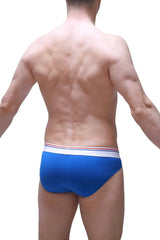 Blue petitq bikini mega bulge modal briefs with white waistband and red and blue stripes