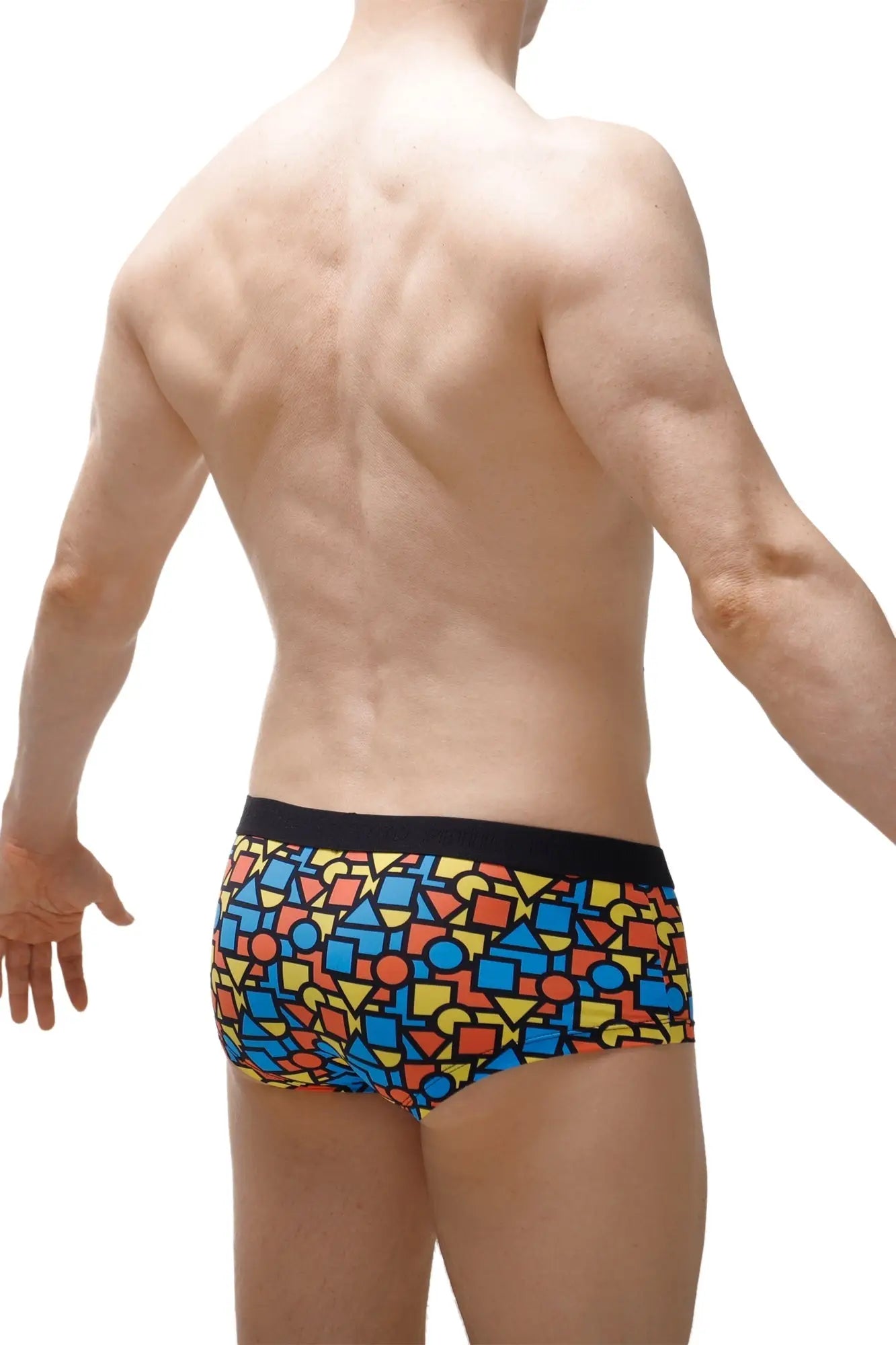 PetitQ boxer brief Mondi featuring vibrant geometric patterns and a bold black waistband for men
