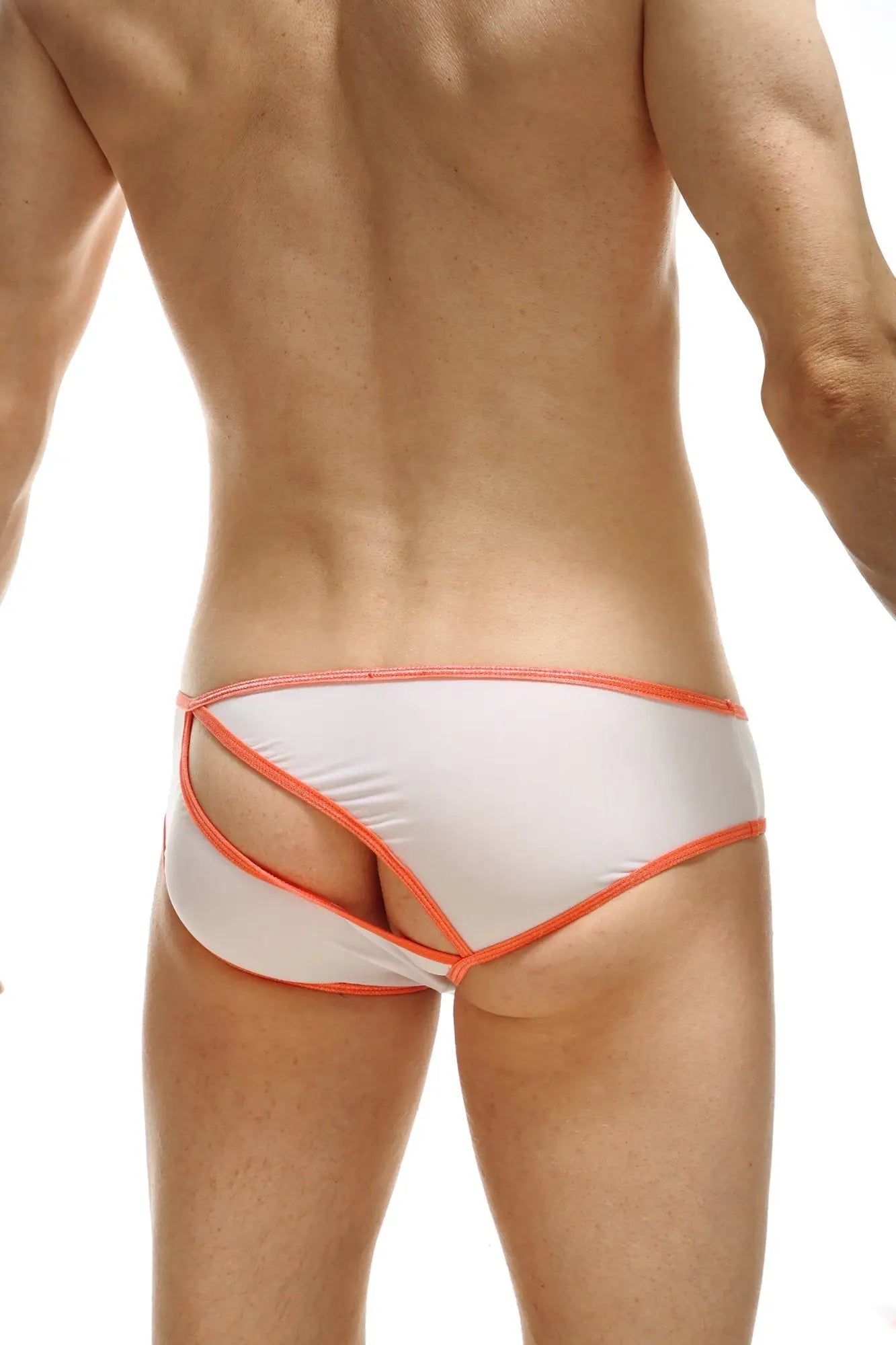 White briefs with orange trim and cut-out design from petitq brief rift plum white collection
