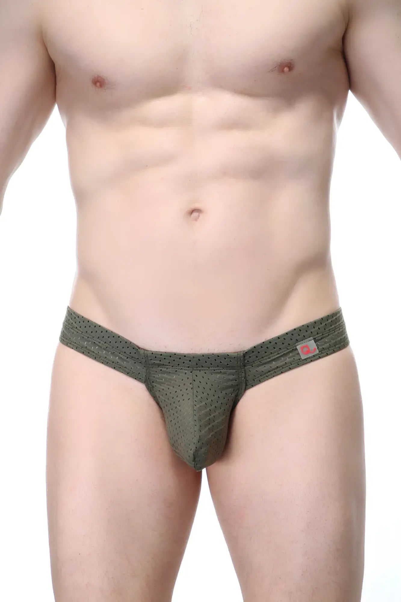 Olive green mesh thong with subtle textured pattern and small pink logo tag on waistband petitq mini boxer cheek bee sage