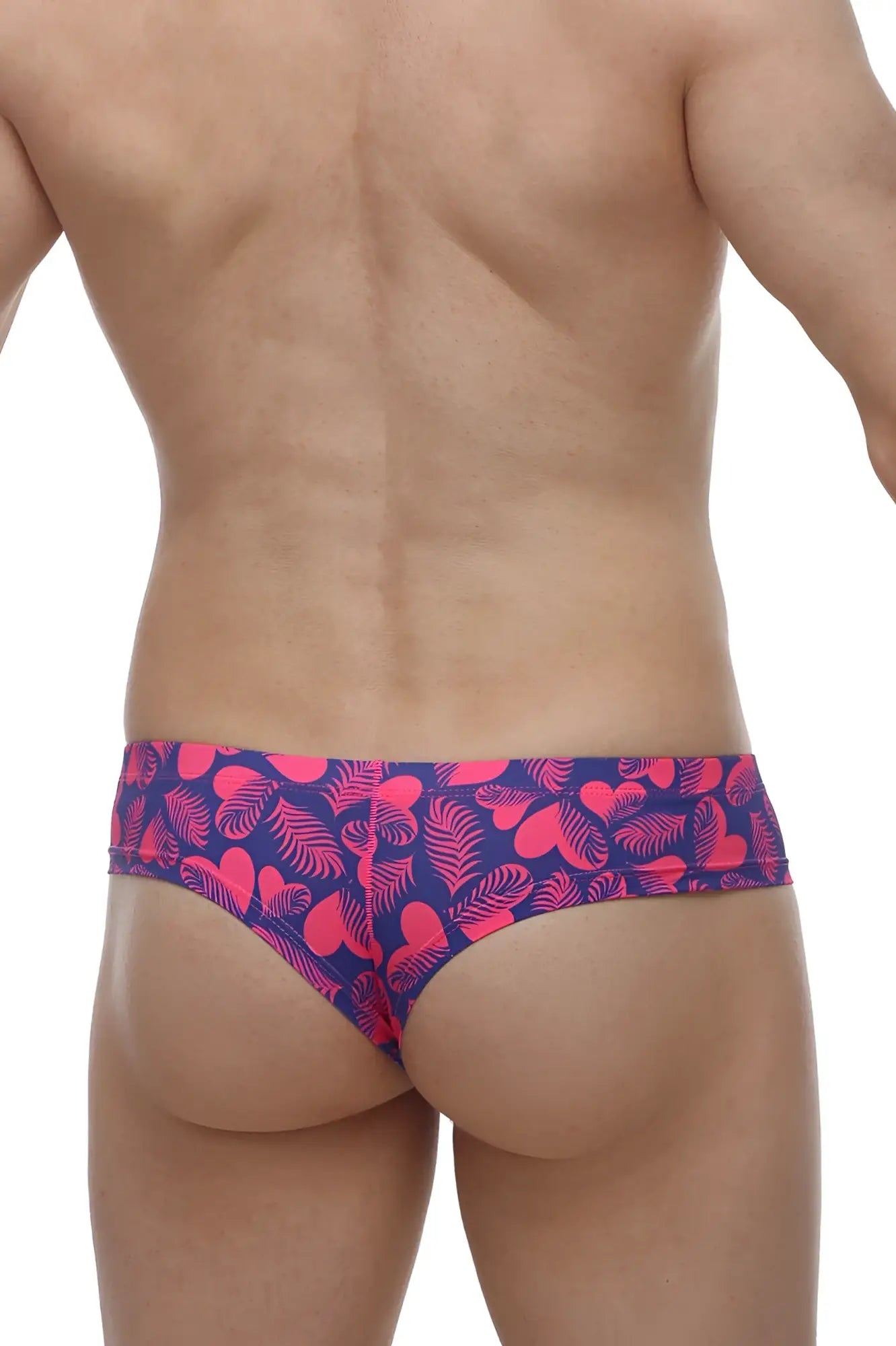 Petitq mini boxer tropical hearts vibrant pink and navy blue swim trunks with tropical leaf pattern for summer wear