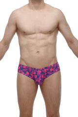 Petitq mini boxer tropical hearts vibrant pink and navy blue patterned swim trunks with tropical leaf design