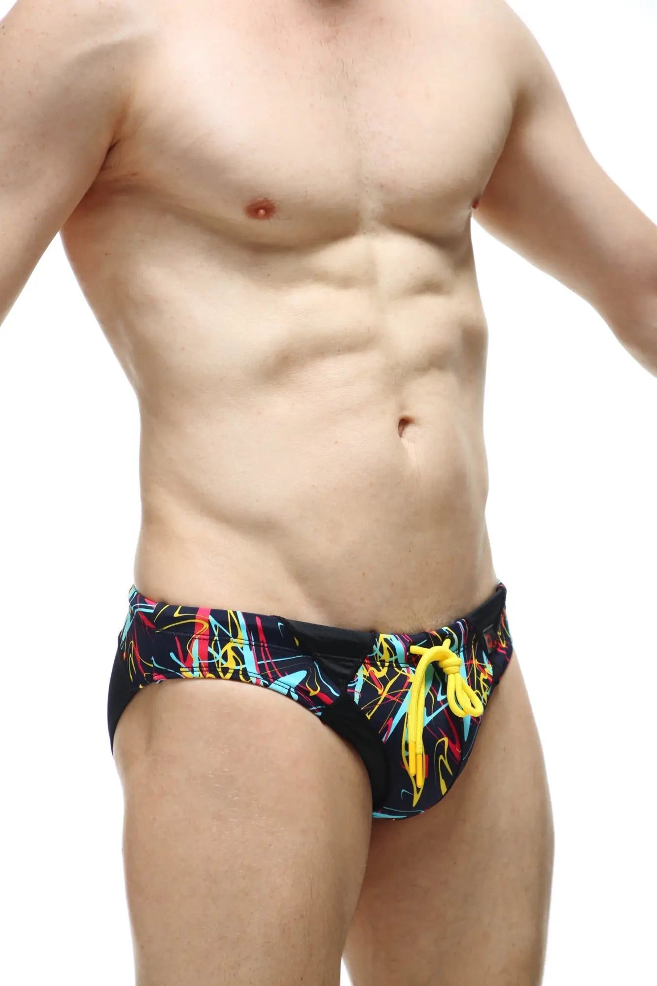 PetitQ swim bikini Lecci Conca with pad black swim trunks with neon yellow cyan pink graffiti pattern and bright yellow drawstrings