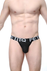 Black mesh briefs with a white petitq logo band from petitq thong cellieux bee black collection
