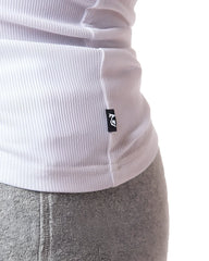 White pig rib tank top made of ribbed knit fabric with a small black logo tag at the hem