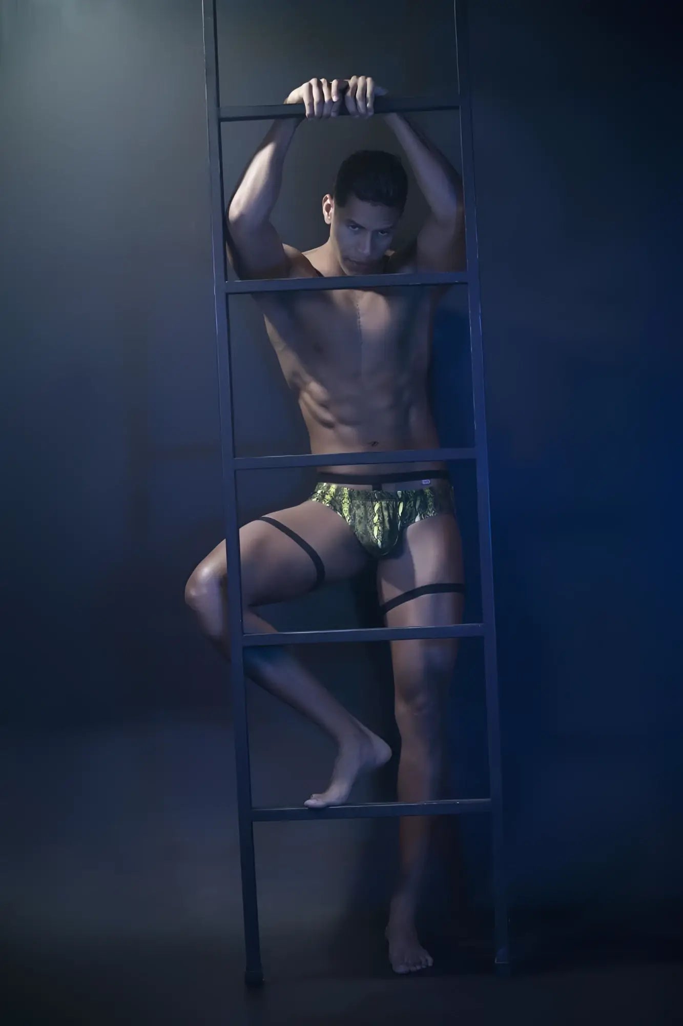 Shimmering green metallic pikante pik 0510 neon briefs featuring black straps for bold statement wear