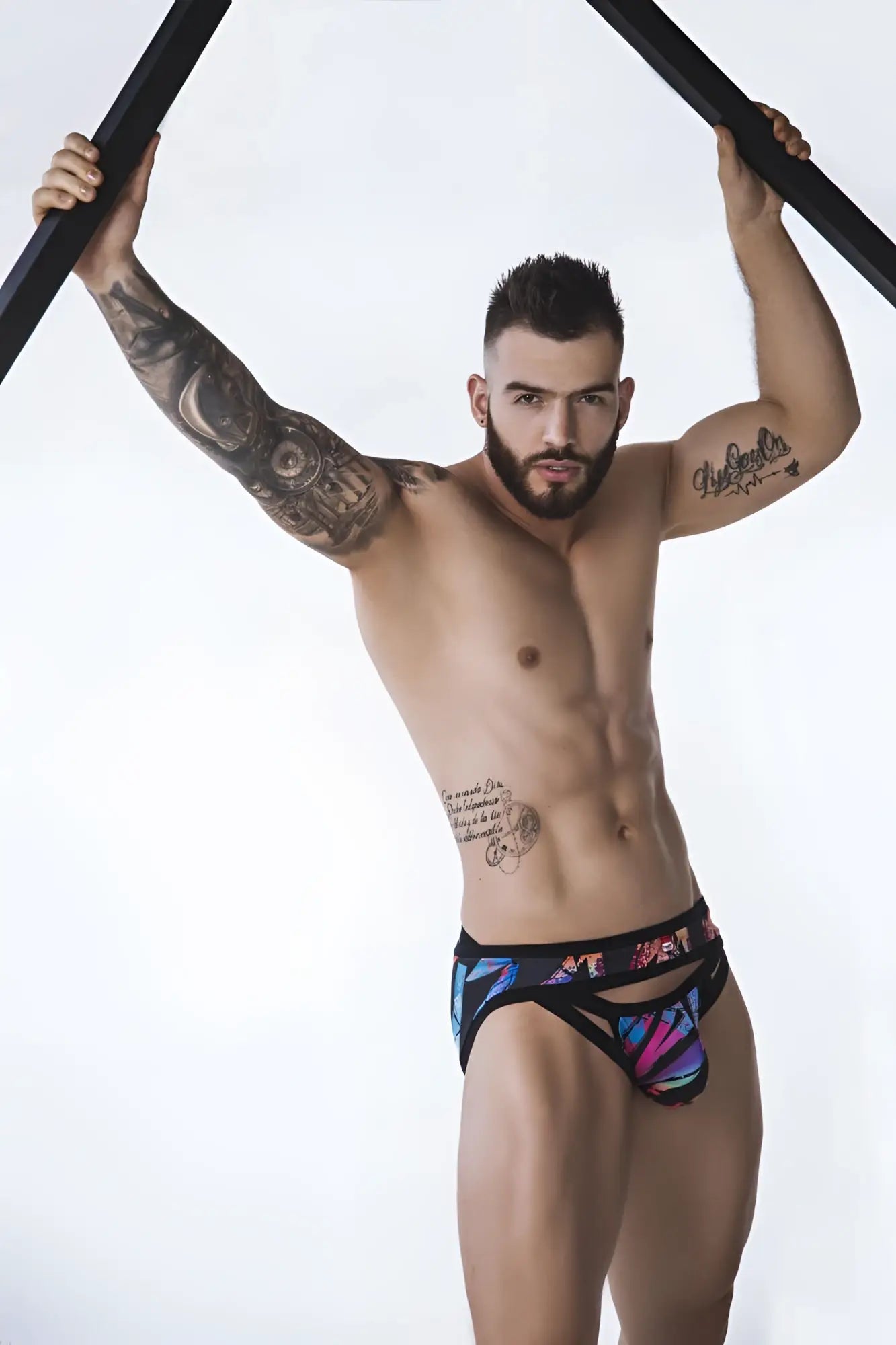 Black pikante pik 0989 jartum briefs with vibrant abstract geometric patterns in blue purple and pink