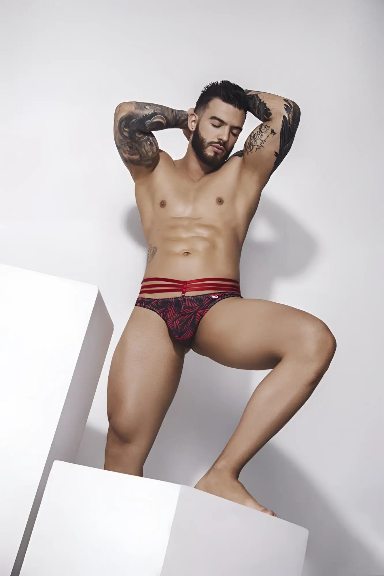 Red and black patterned pikante pik 1080 fiery jockstrap with three horizontal red stripes on the waistband