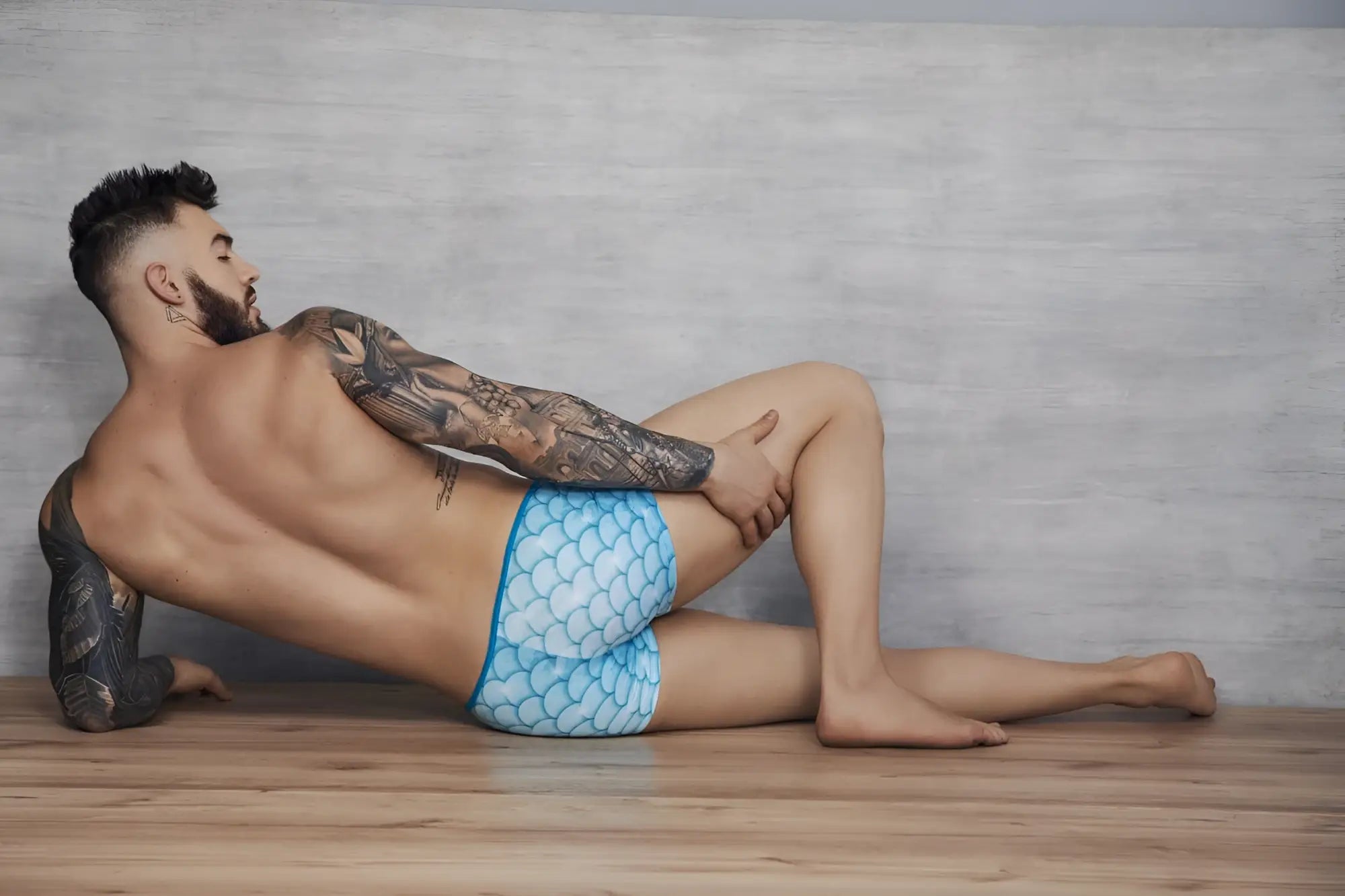 Light blue mermaid scale patterned swim trunks pikante pIK 1268 roskilde trunks color blue front view