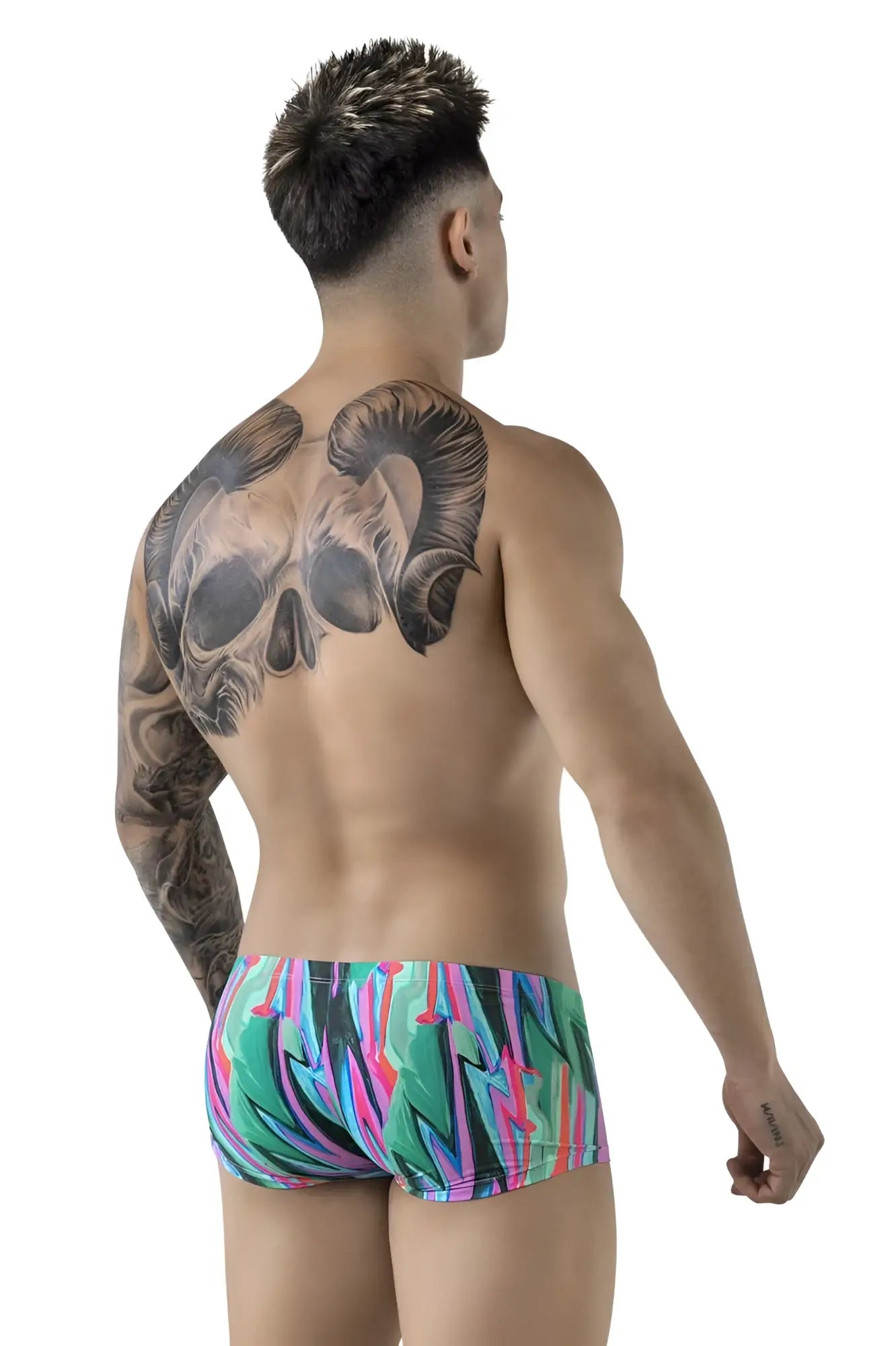 Vibrant pikante pik 1828 abstract trunks in teal pink and black graffiti style perfect for swimming and beachwear