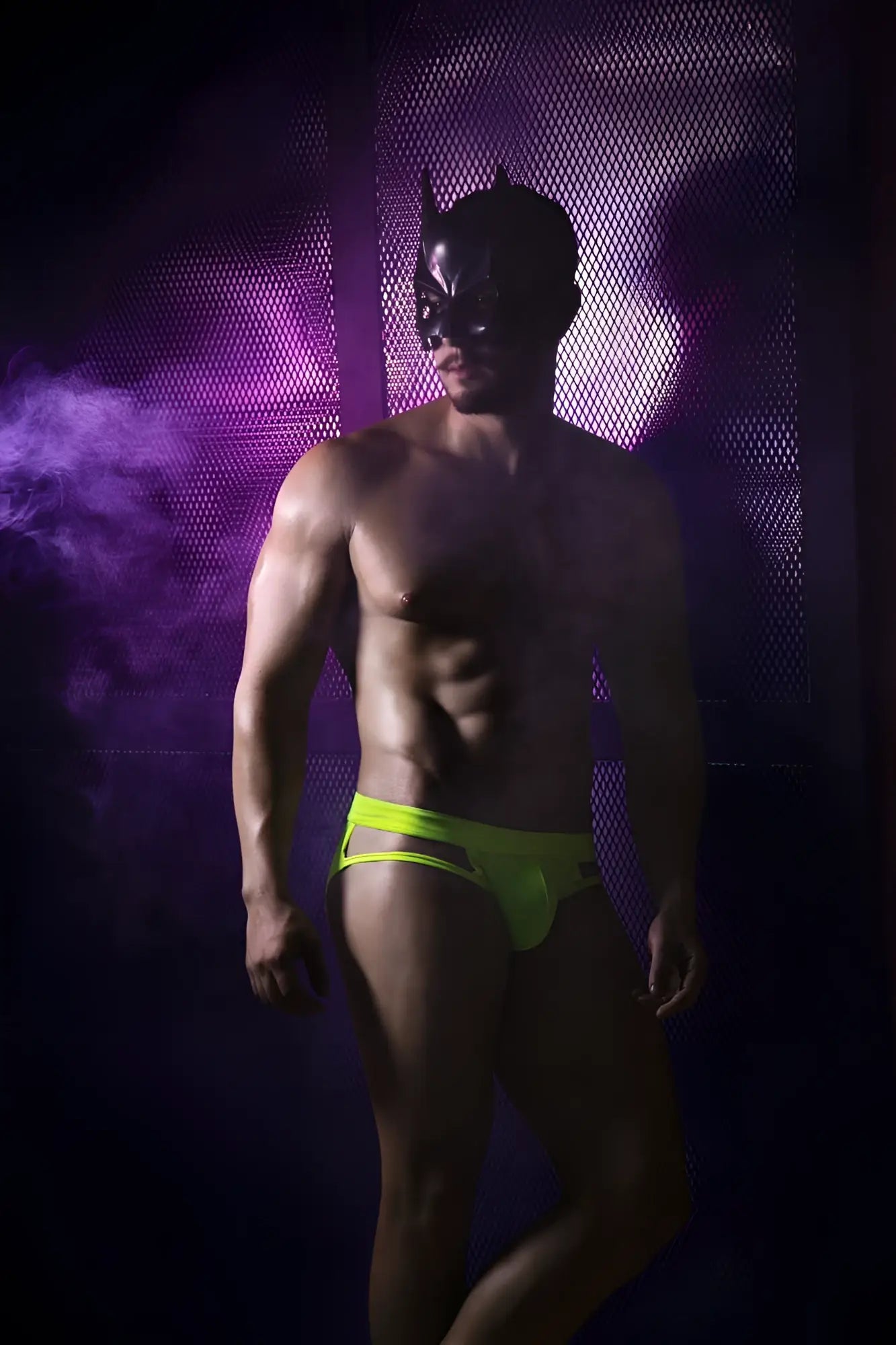A man wearing a black batman mask models pikante PIK 2114 Lenox neon green briefs for a bold look