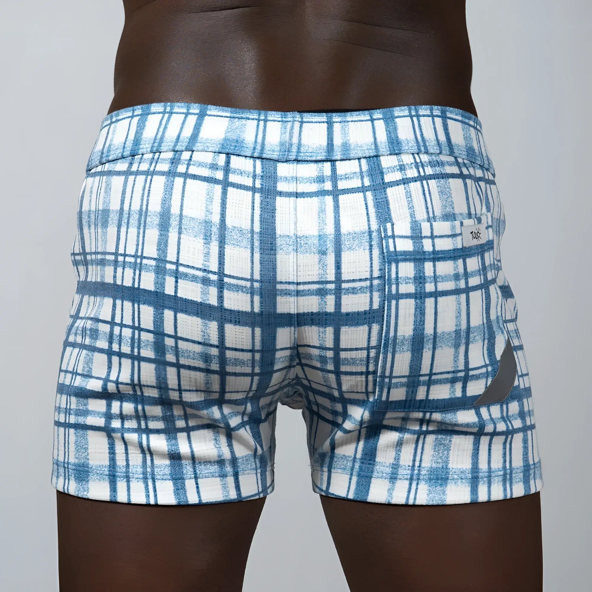 Blue and white plaid print linen texture shorts with a textured fabric finish for casual summer wear