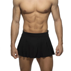 Black pleated athletic shorts made of lightweight fabric designed for active wear in the pleated ring skirt style