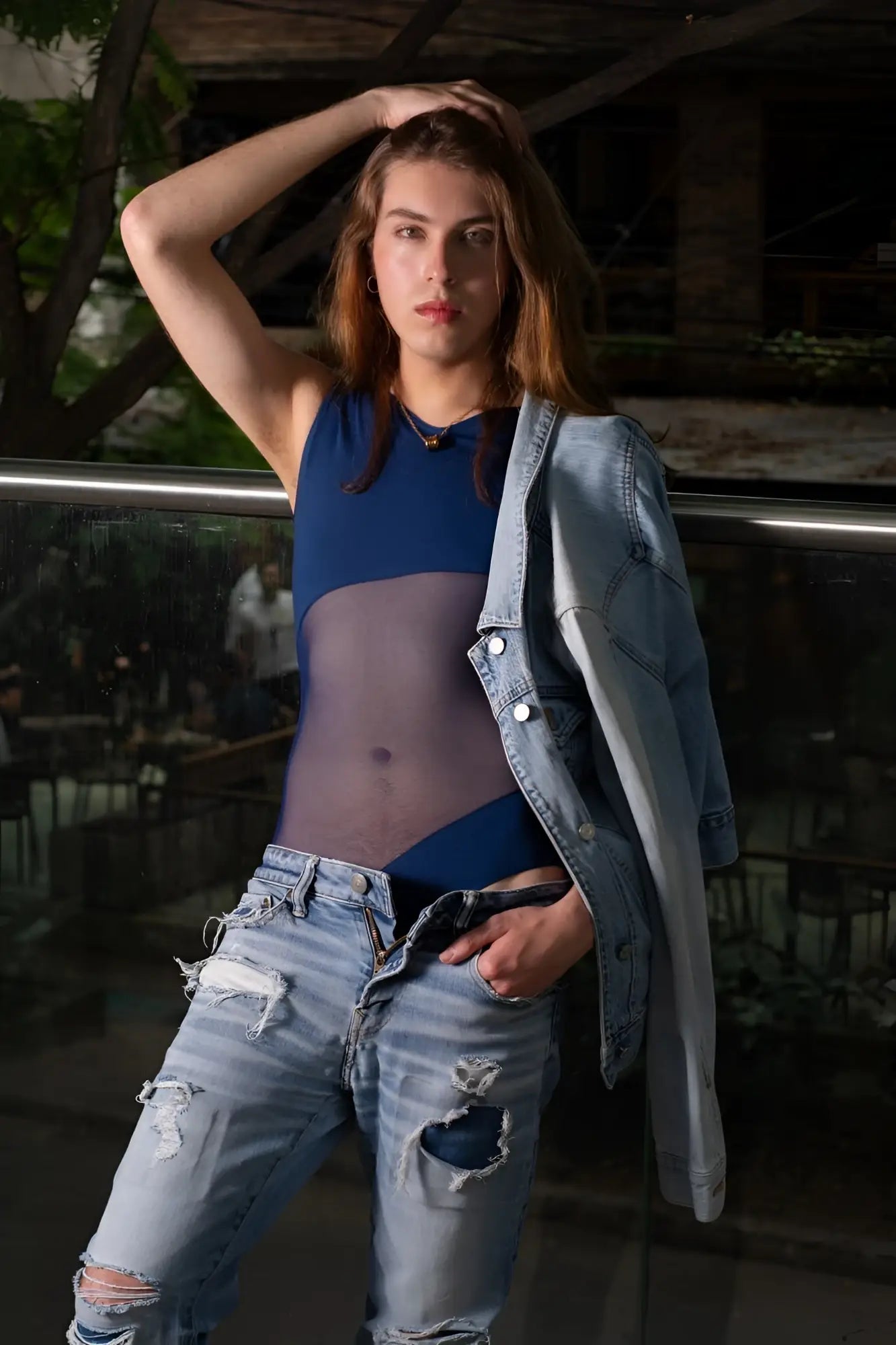 Blue plural pl002 bodysuit with mesh top detail paired with denim jacket and ripped jeans outfit visible from front