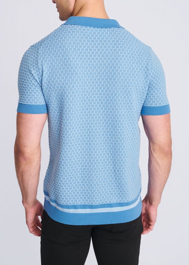 Light blue short-sleeved honeycomb textured knit shirt with subtle hexagonal pattern and matching ribbed trims