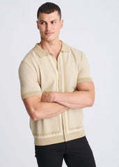 Beige honeycomb textured button front knit shirt with subtle vertical stripes and ribbed cuffs in knit fabric
