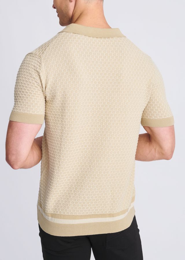 Beige short-sleeved polo shirt with honeycomb textured knit pattern and ribbed collar cuffs and hem
