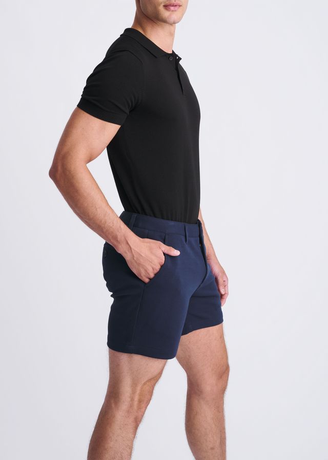 Navy blue textured stretch knit chino shorts with a modern cut and subtle side pockets for casual wear