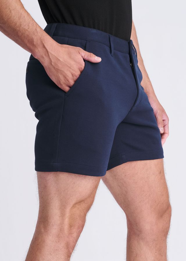 Navy blue textured stretch knit chino shorts with tailored fit and subtle side seam detailing for a modern look