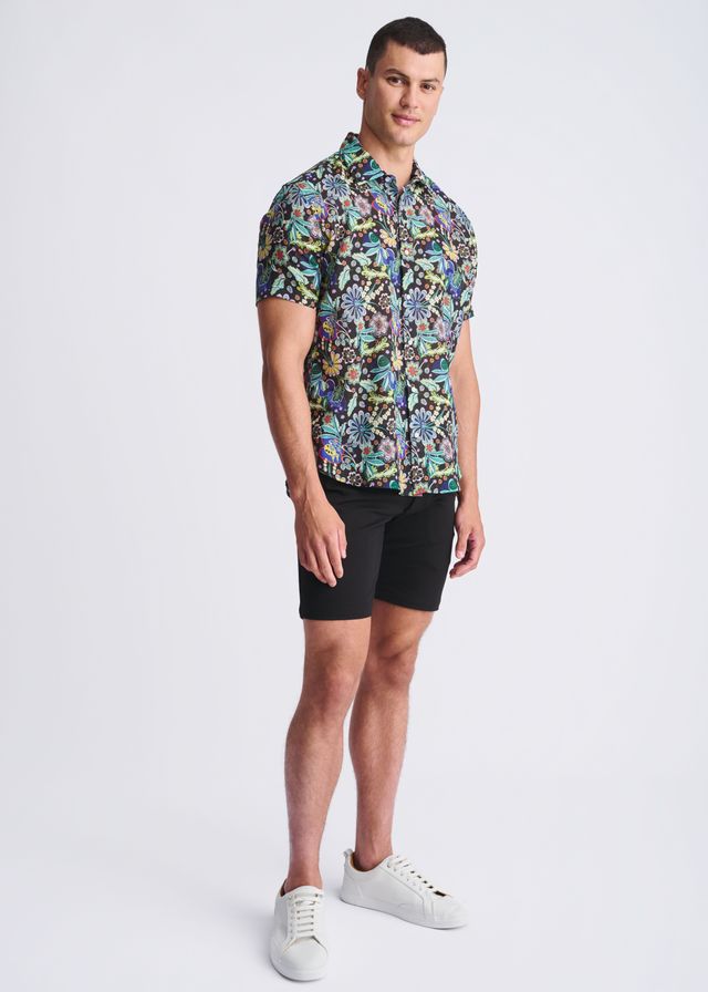 Men’s short-sleeved button-up shirt with vibrant multicolored floral pattern on dark lightweight linen tencel fabric