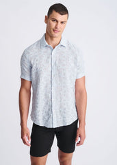 Light blue lightweight jacquard short-sleeved shirt with a subtle textured pattern perfect for warm weather