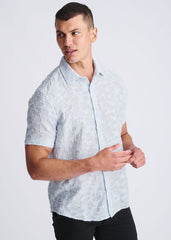 Light blue lightweight jaquard short-sleeved shirt with subtle textured pattern perfect for casual wear