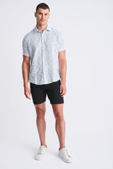Light blue lightweight jaquard short-sleeved shirt with a subtle floral pattern perfect for warm weather wear