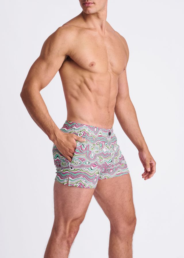 Men’s swim trunks with vibrant pink green and white swirls print seersucker fabric and mesh lining