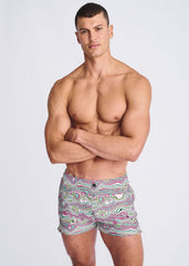 Men’s swirls print seersucker swim shorts with mesh lining featuring vibrant pink green and white abstract waves on gray
