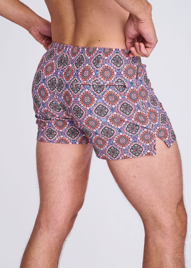 Medallions seersucker swim shorts with mesh lining featuring mauve coral and muted purple geometric medallion patterns