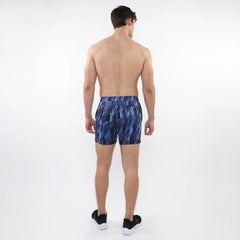 Printed mesh stretch performance shorts in blue with an abstract pattern and fitted waistband for athletic use