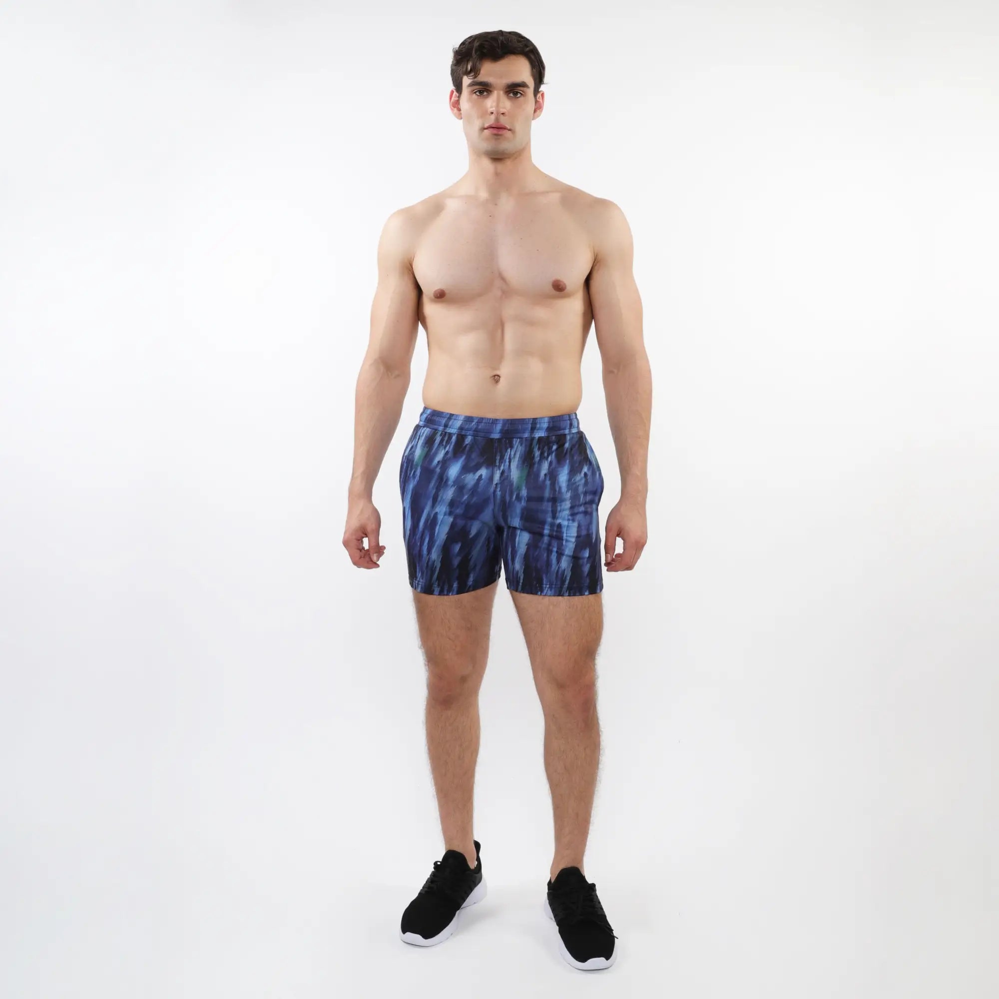 Printed mesh stretch performance shorts in blue tie-dye with a modern abstract athletic pattern